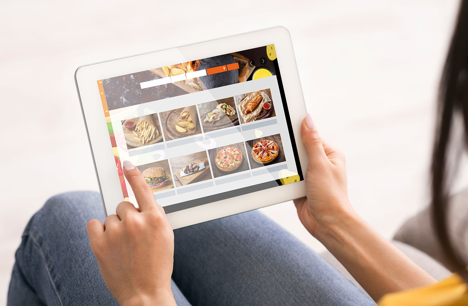 Woman Using Tablet To Order Food Online On Restaurant Website From Home